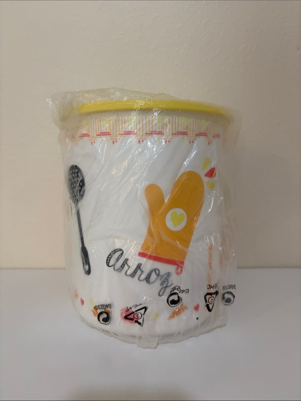 New Tupperware One Touch Canister with
 Arroz design for rice.